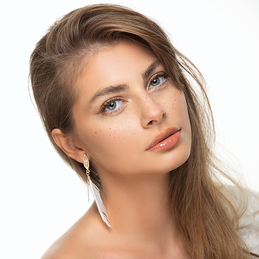 beautiful headshot of model, brown hair, grey eyes