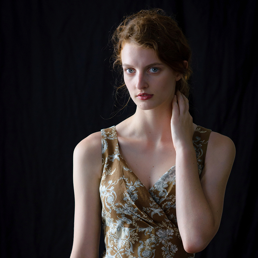 Actors headshot, blonde woman in patterned dress