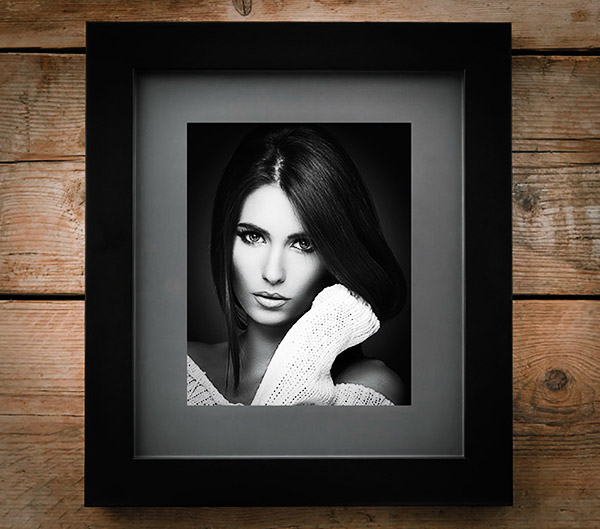 Black frame with image of beautiful woman