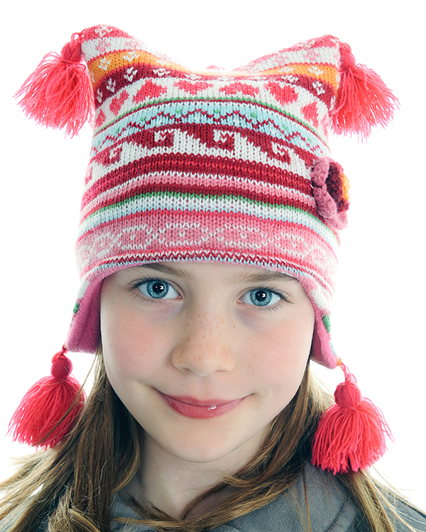 Portrait of beautiful girl wearing traditional hat