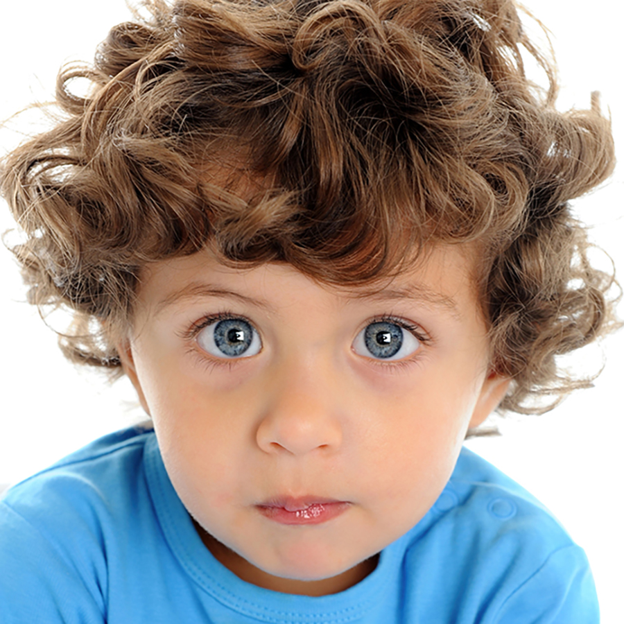 Portrait of young boy with big blue eyes